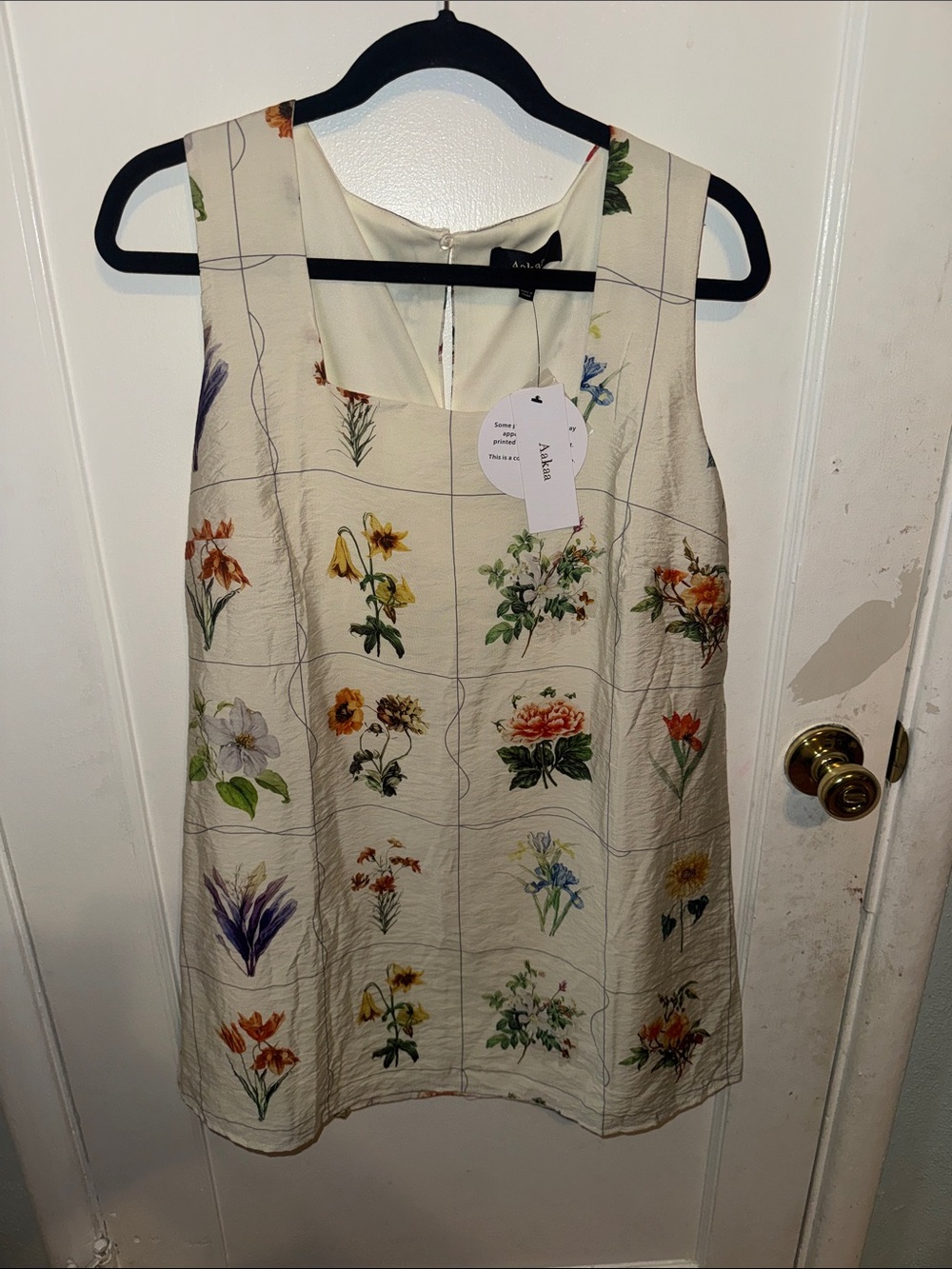 Aakaa Cream Floral Sleeveless Tunic Top